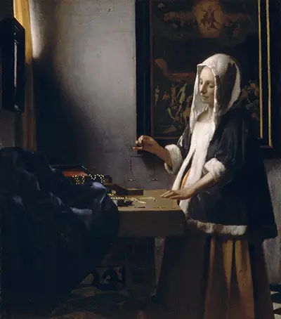 Woman Holding a Balance Vermeer